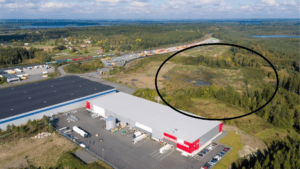 Flygbild över industriområde vid Terminalgatan i Nässjö, med markerat område för utveckling.